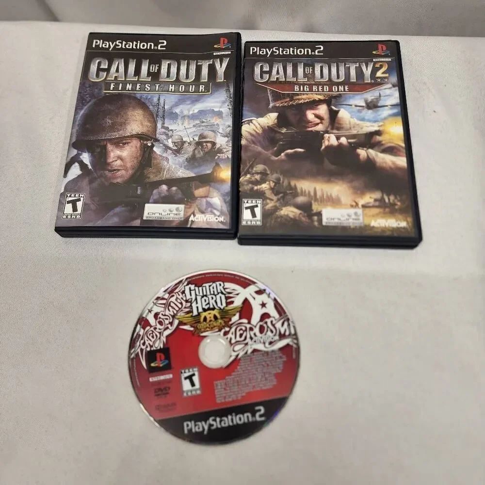 Sony Playstation 2 Lot 3 Games Untested Call of Duty Guitar Hero Aerosmith